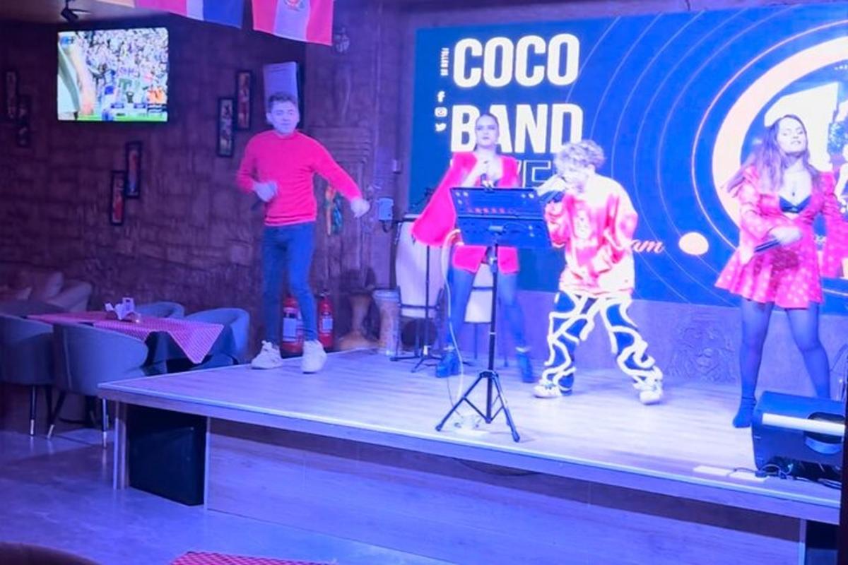 a group of people standing on a stage