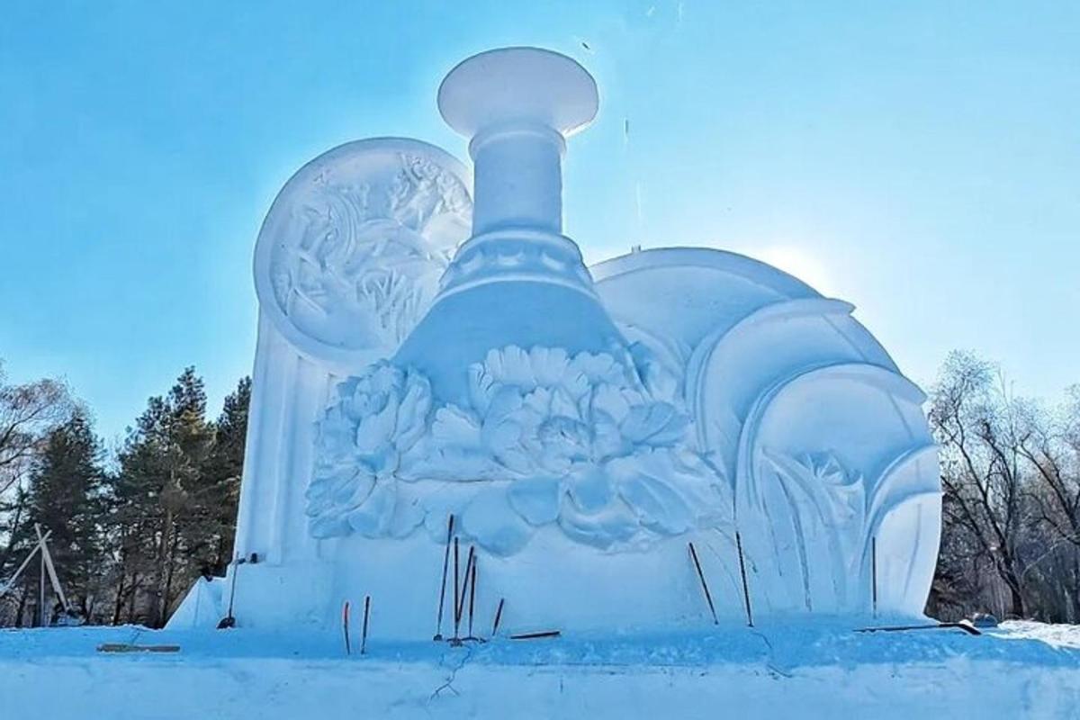 a large blue object with snow on it