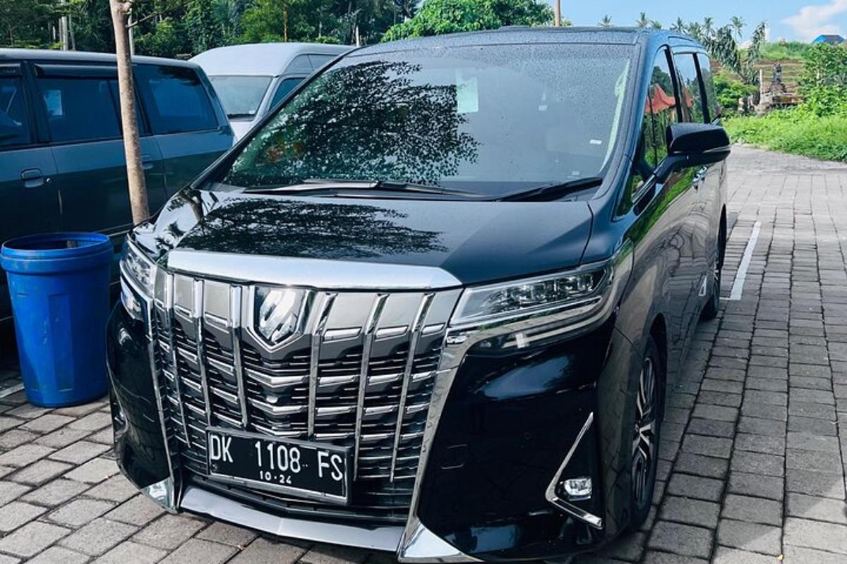 a black suv parked in a parking lot