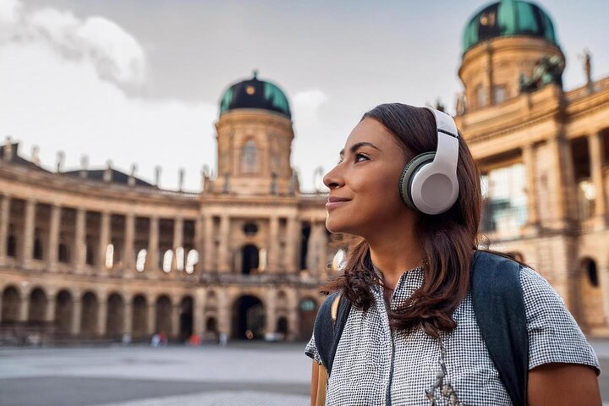 a woman wearing headphones in front of a building