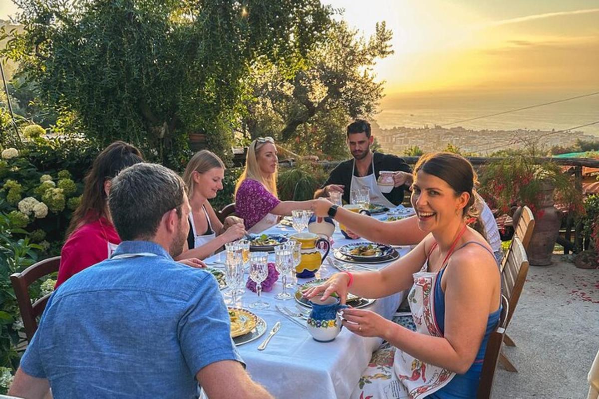 a group of people sitting around a table eating