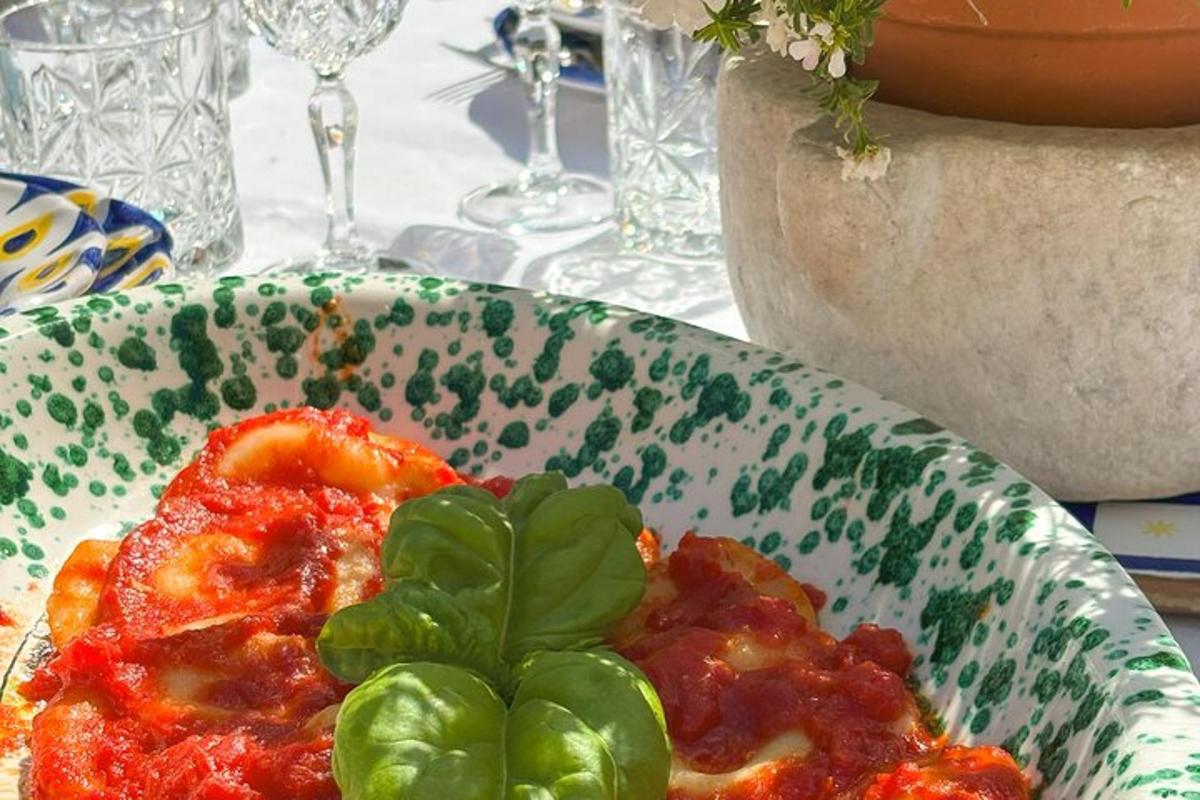 a bowl of food with a green plant in it