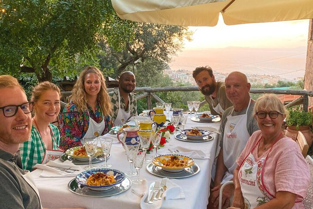 a group of people sitting at a table eating food