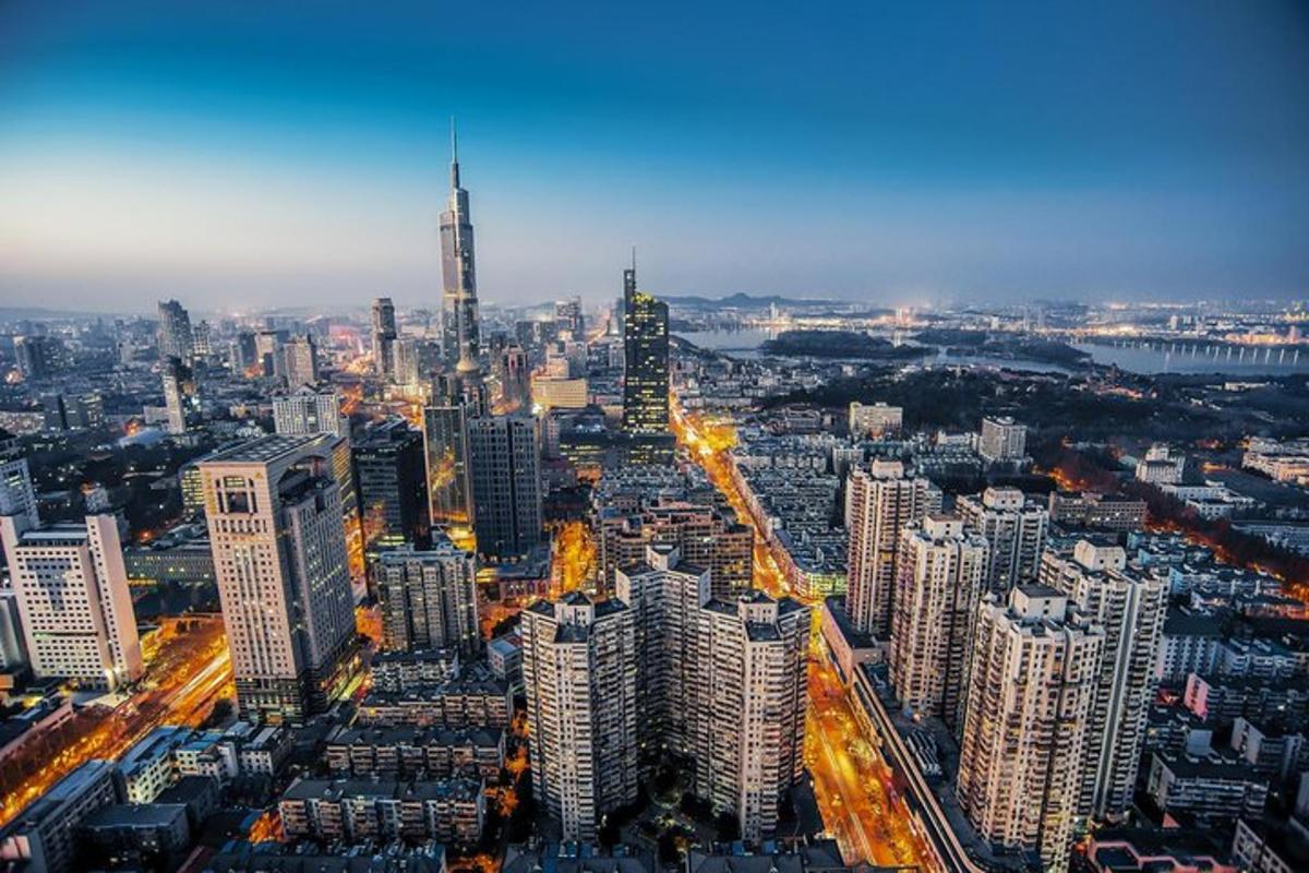 an aerial view of a city at night