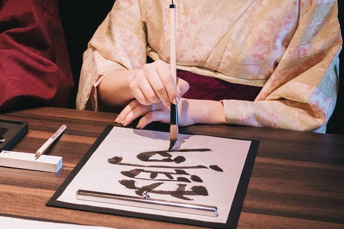 a person cutting a sign with a knife on a table