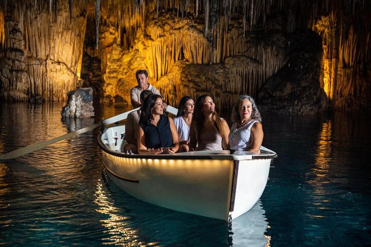 a group of people in a boat in a cave