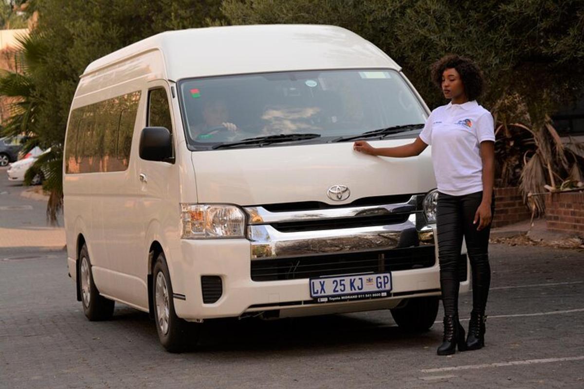 a woman standing in front of a white van