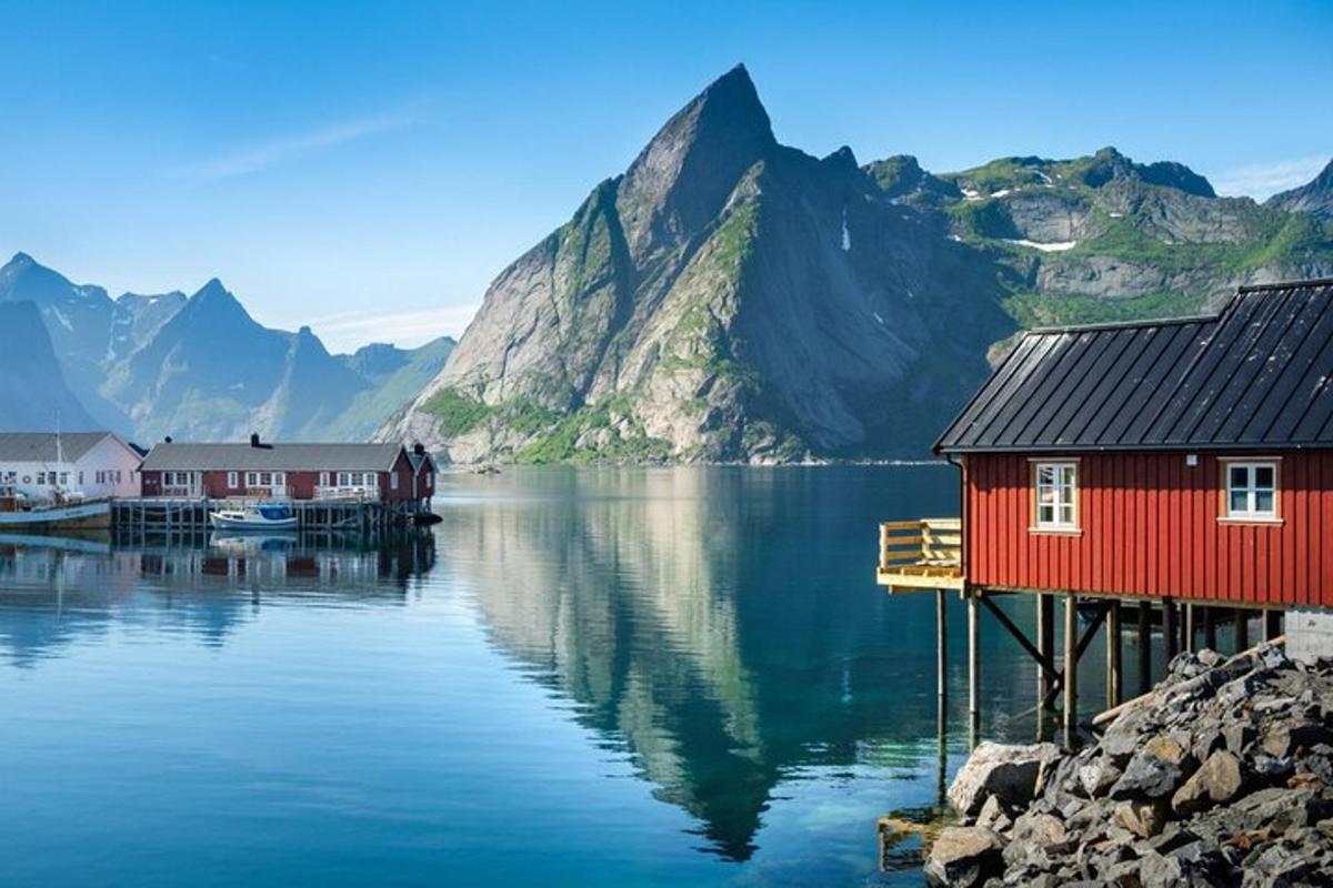 a view of a lake with houses and mountains
