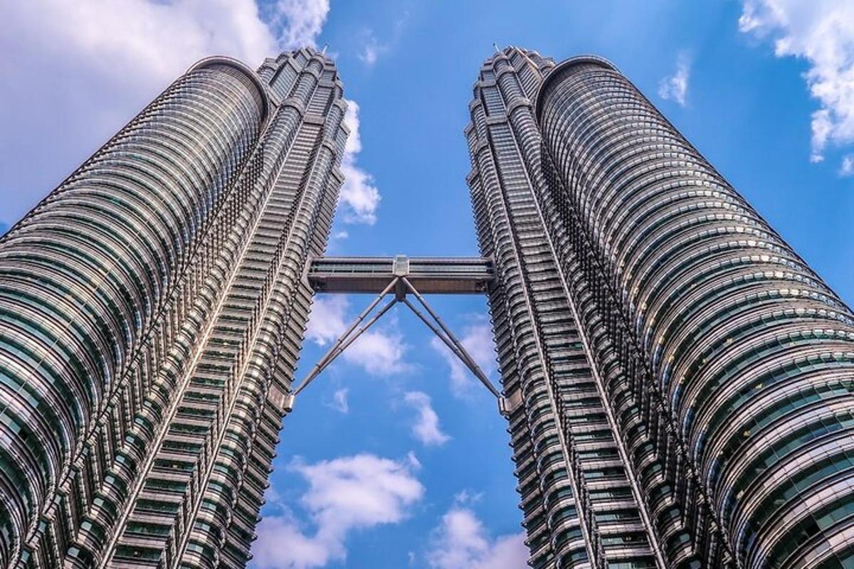 two tall buildings are next to each other
