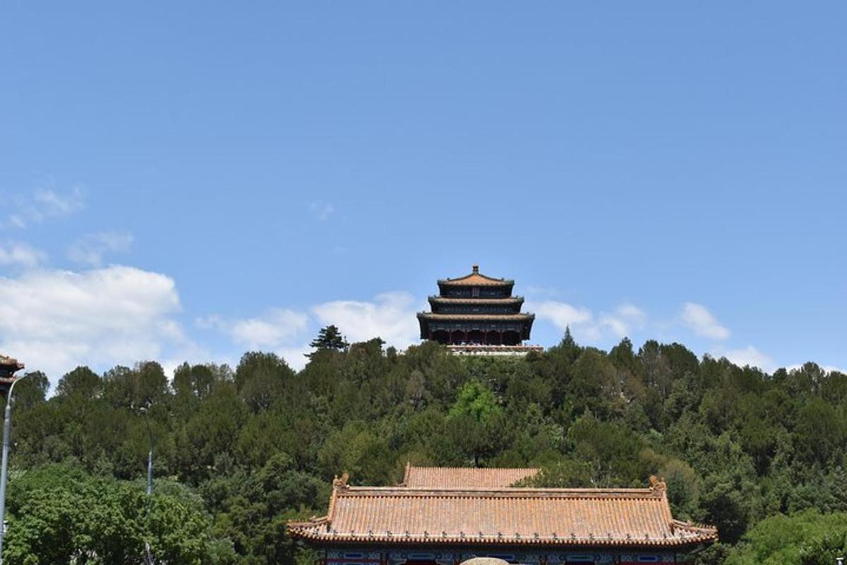 a building on top of a hill with a tower