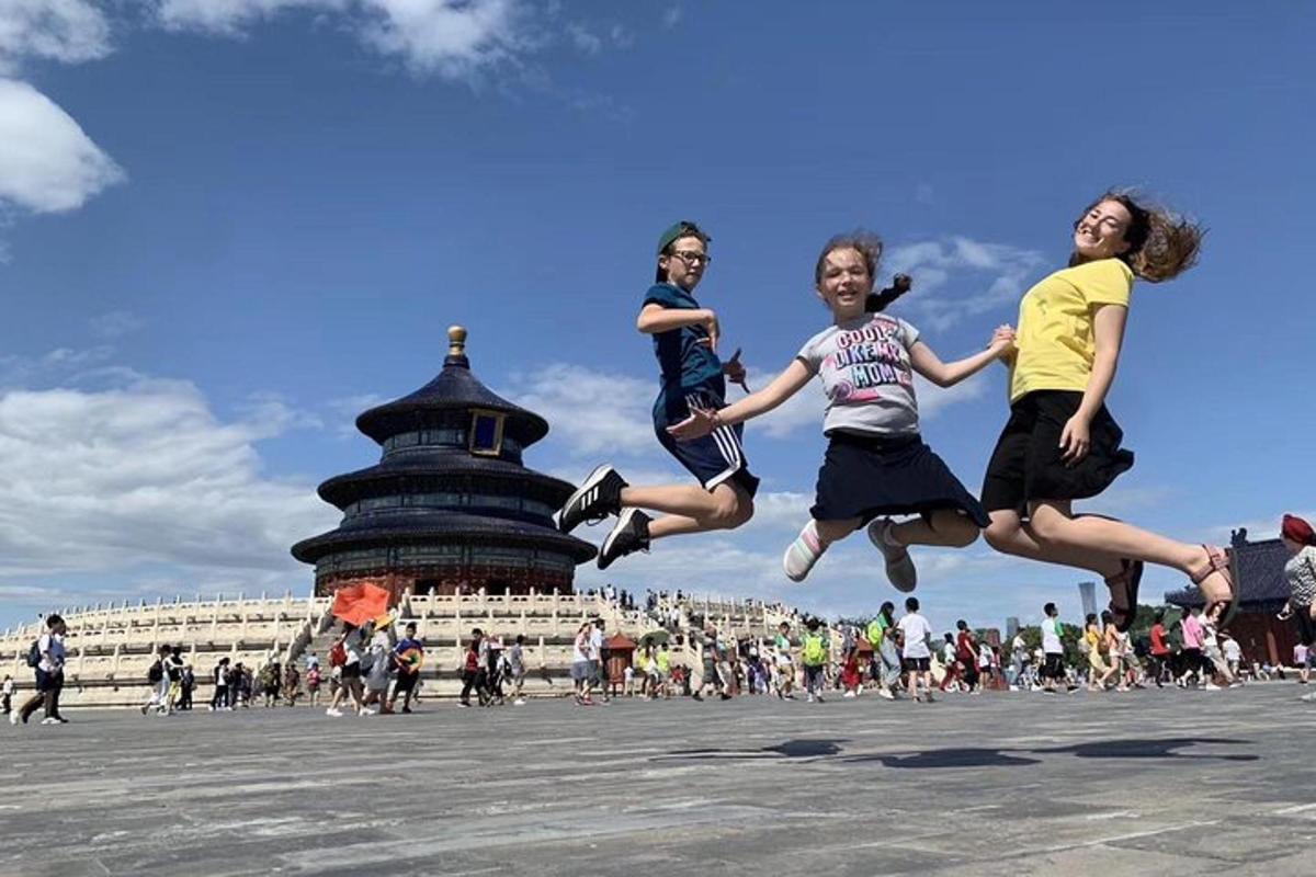 a group of people jumping in the air