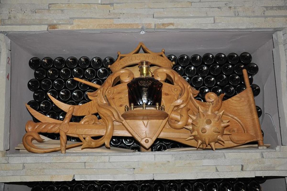 a wooden wall with a bunch of black objects