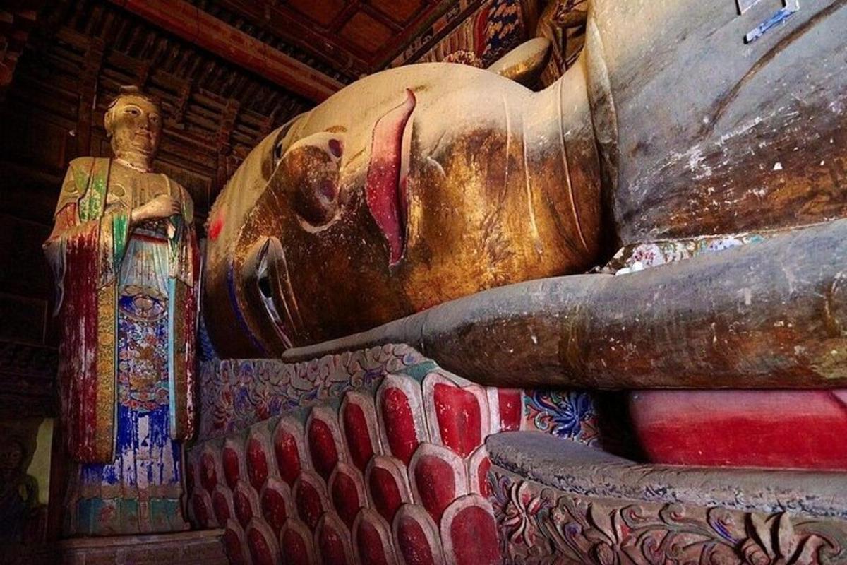 a statue of an elephant and a statue of a person
