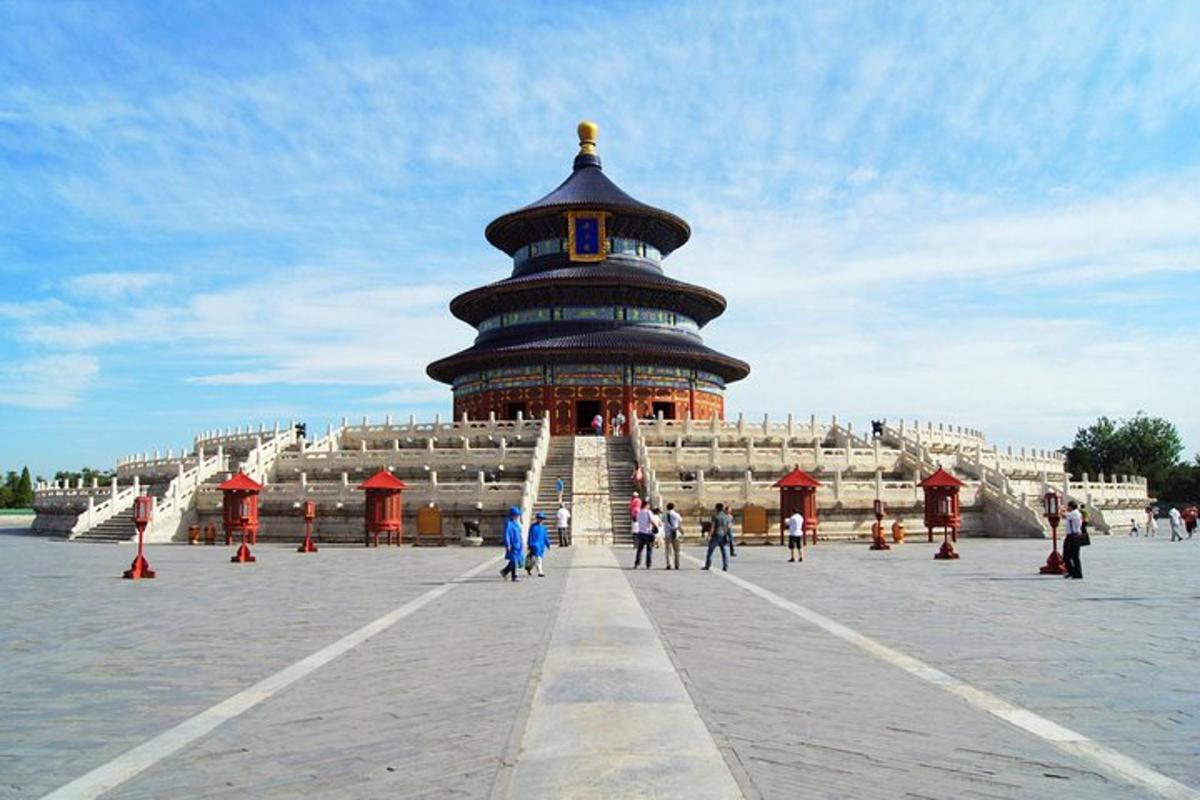 a large building with a tower in front of it