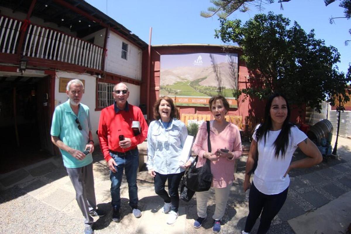 a group of people standing in front of a building
