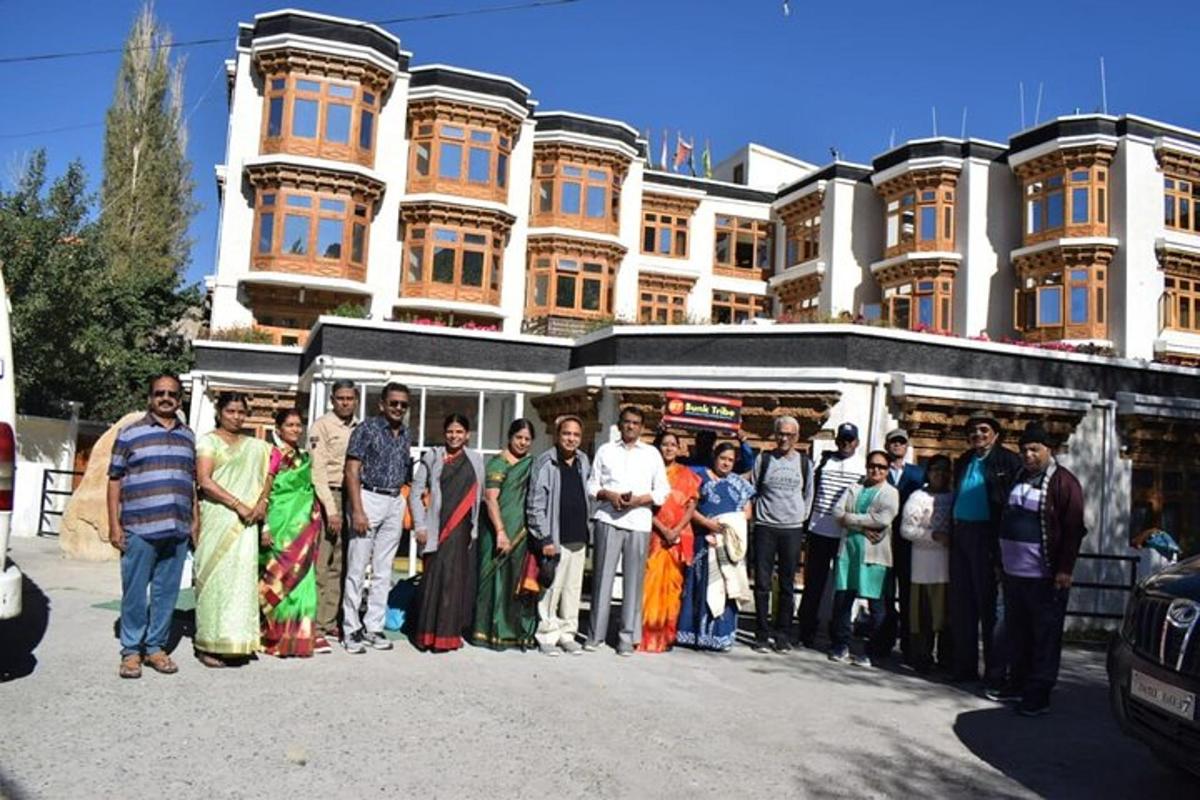 a group of people standing in front of a building