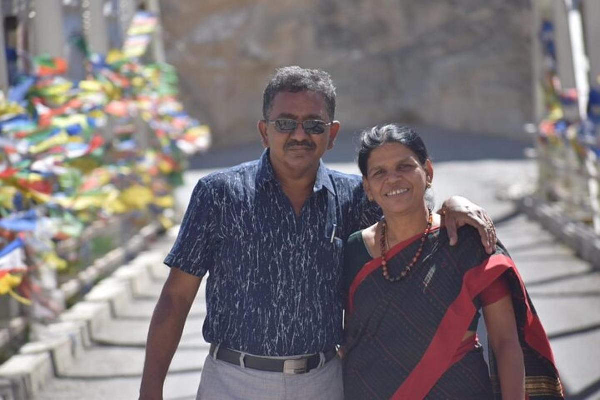 a man and a woman posing for a picture