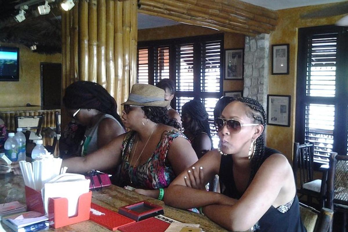 a group of women sitting at a table in a restaurant