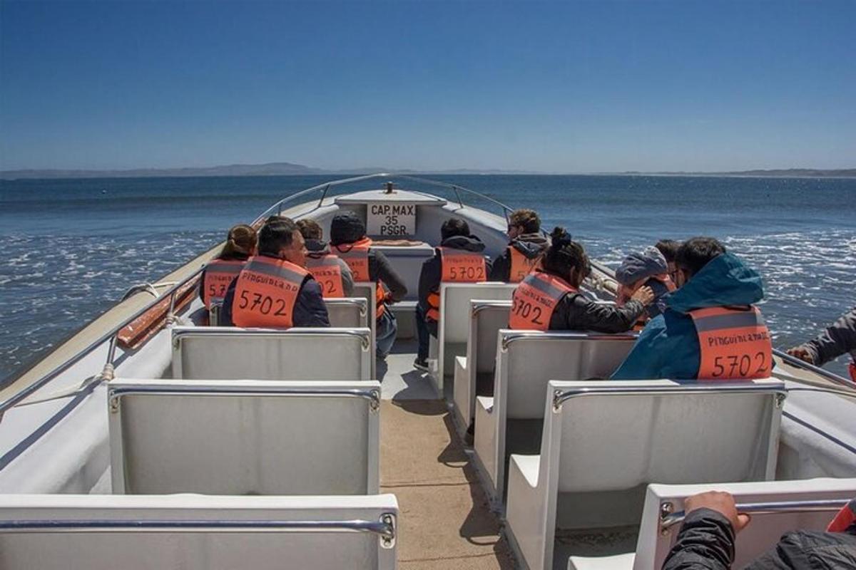a group of people on a boat in the water