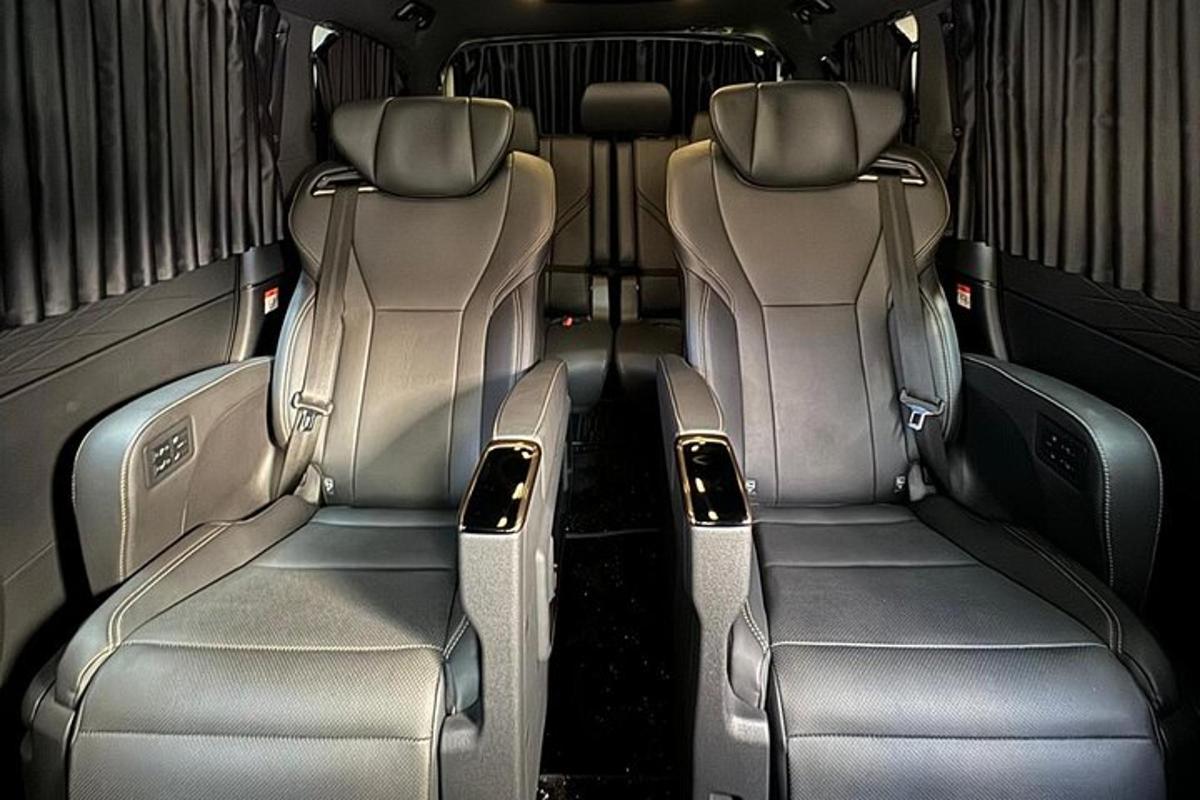 two empty seats in the back of a car