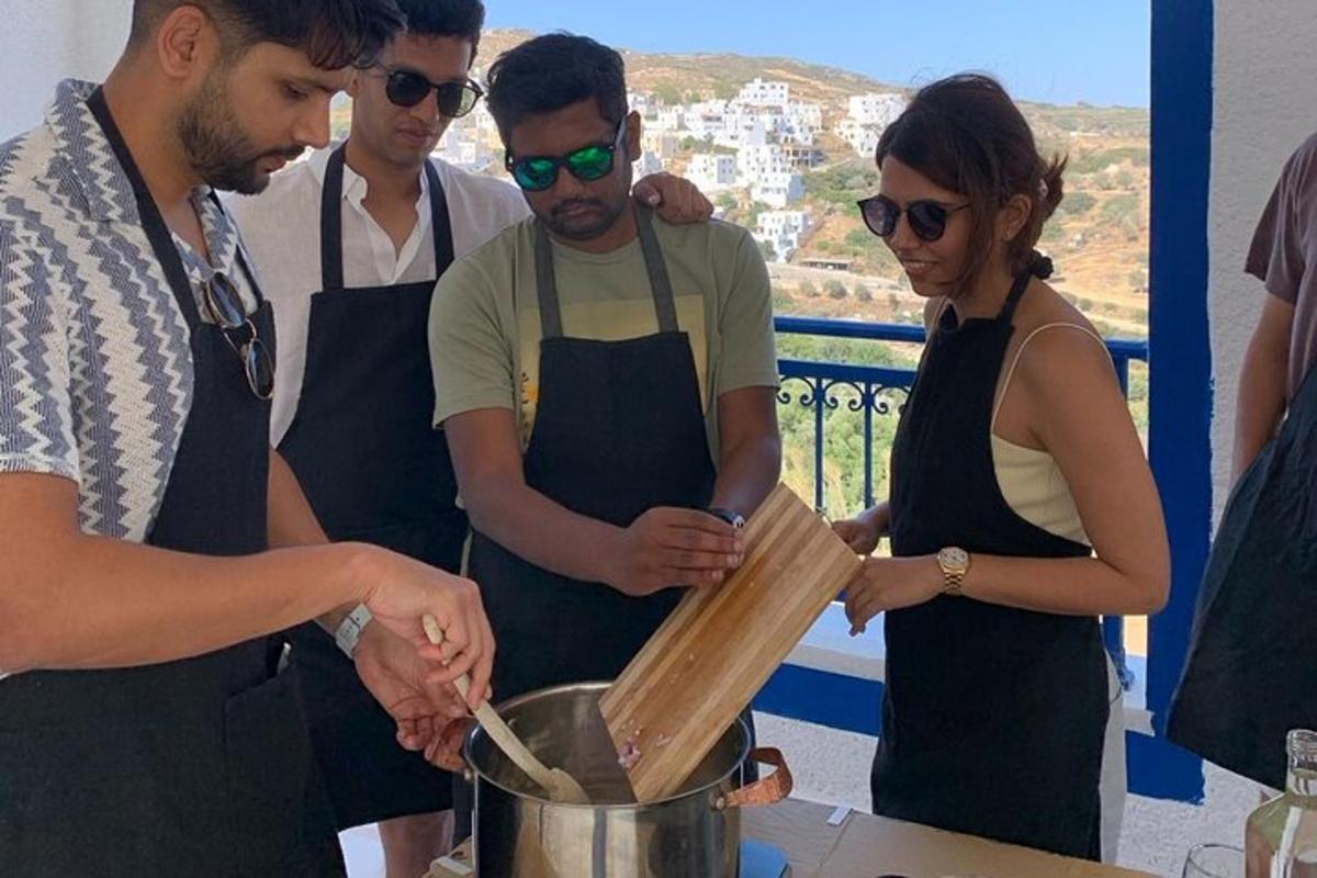 a group of people in a kitchen preparing food