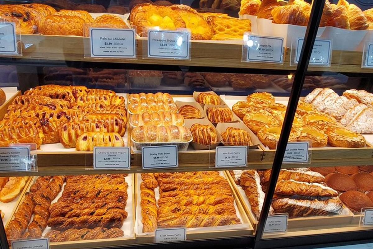 a bakery filled with lots of different types of pastries
