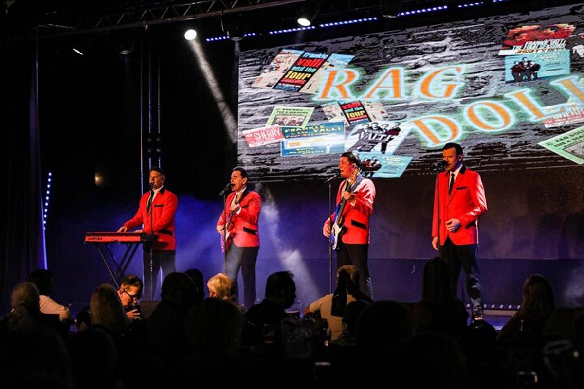 a group of men standing on a stage