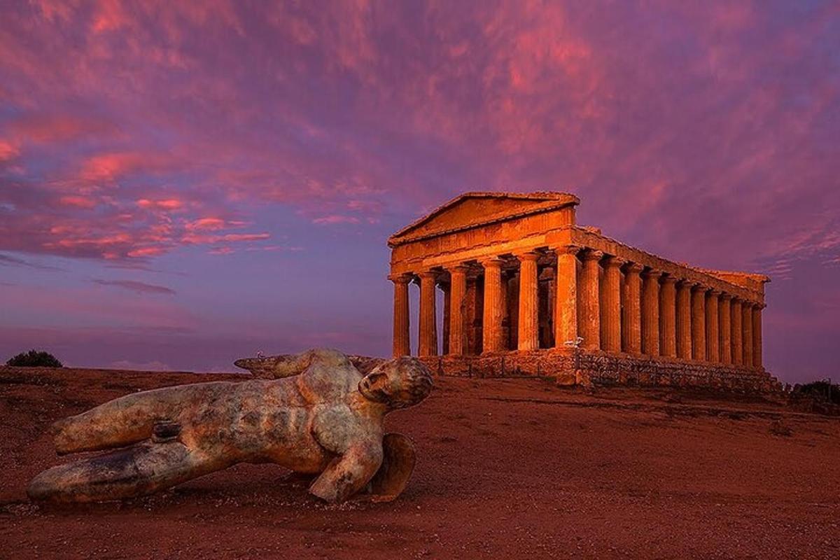 a statue of a lion in front of a building