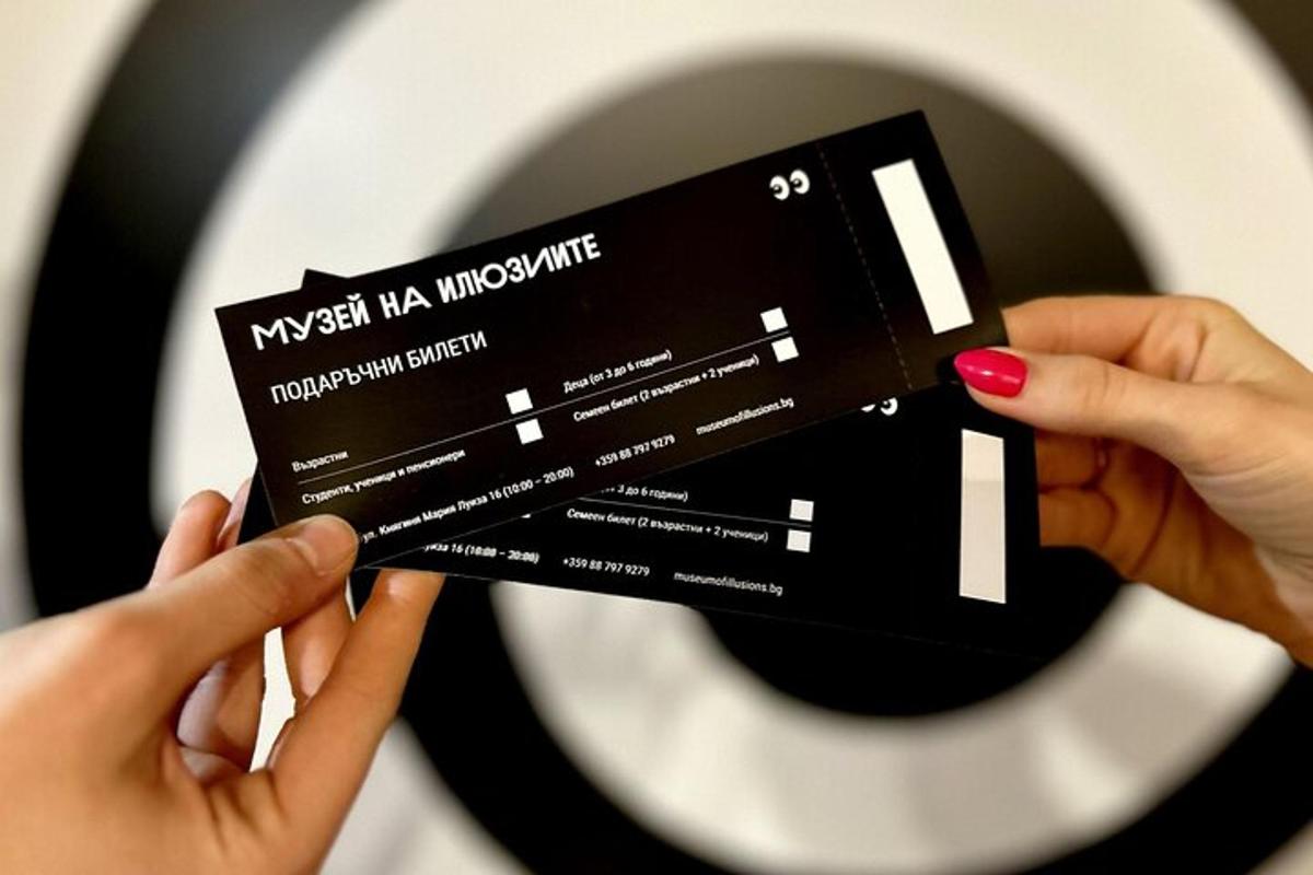 a person holding a credit card in their hand