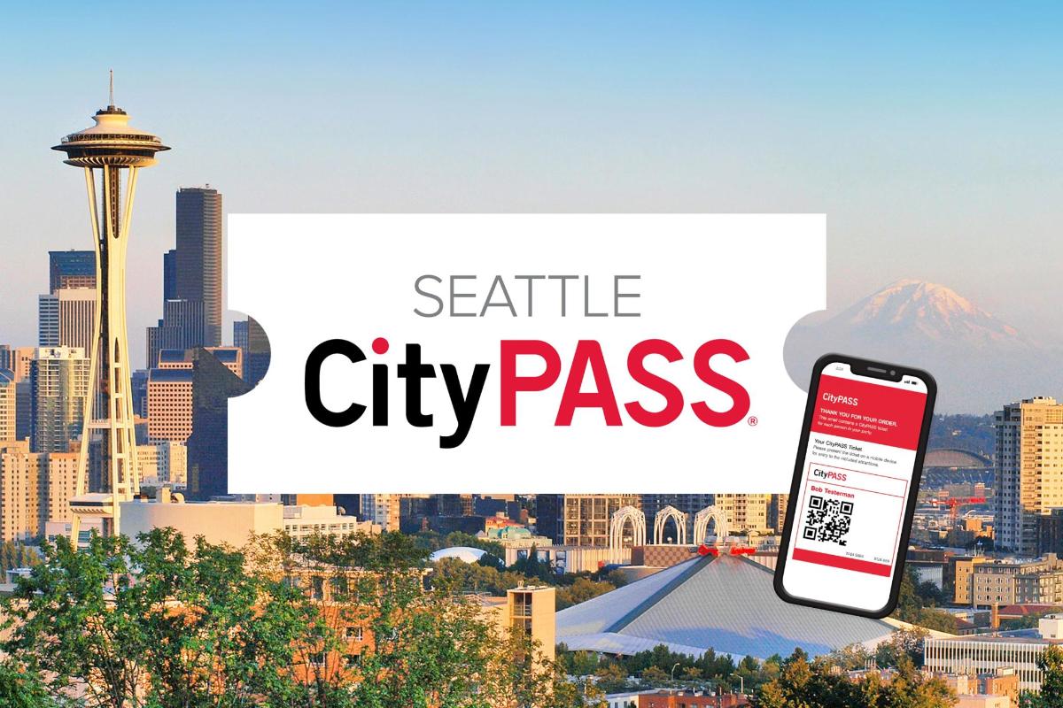 a city pass with a cell phone in front of a city