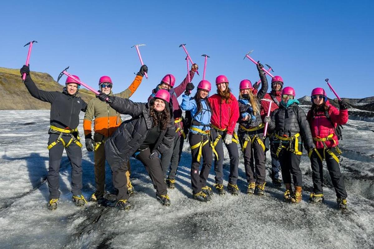 a group of people posing for a picture on the ice