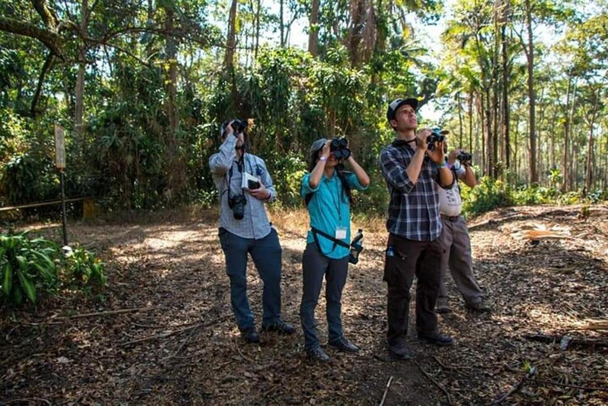 a group of people taking pictures with cameras