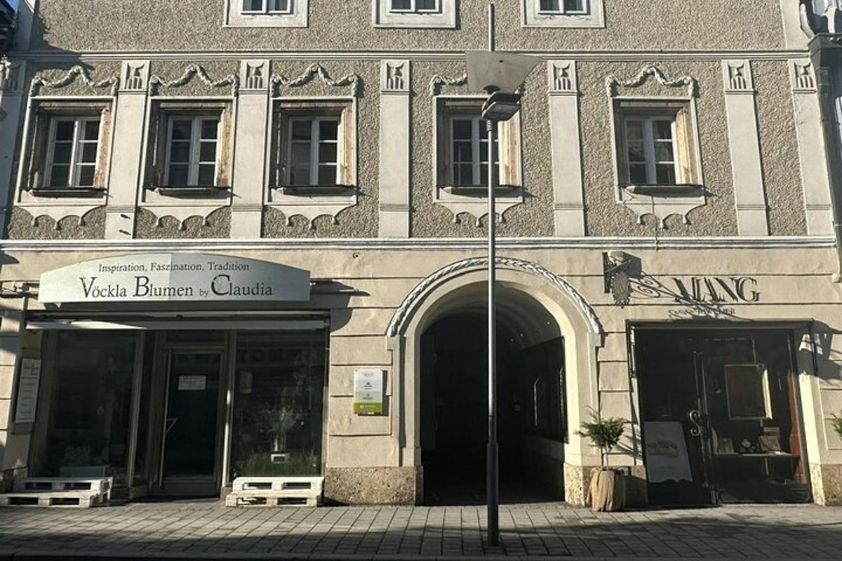 a building on a street with a street light in front
