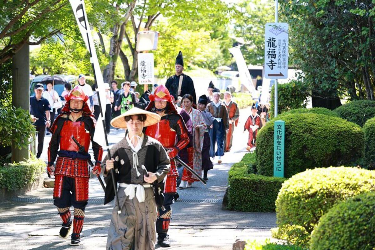 a group of people in costumes walking down a sidewalk