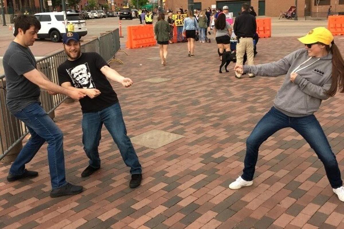 a group of men playing a game on a street
