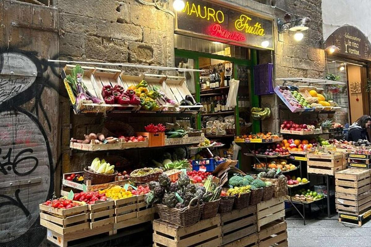 a market with many baskets of fruits and vegetables