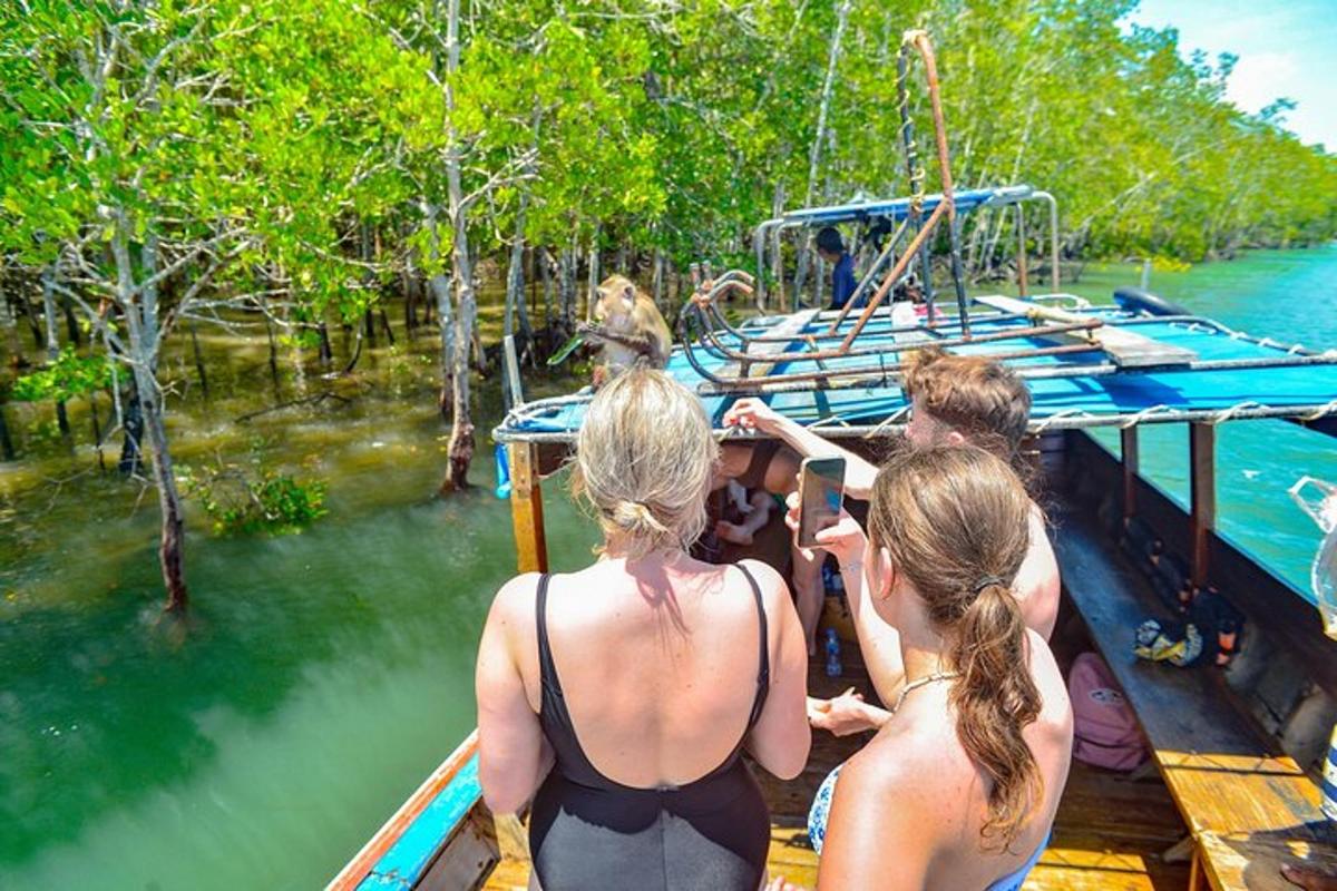 a group of people on a boat in the water