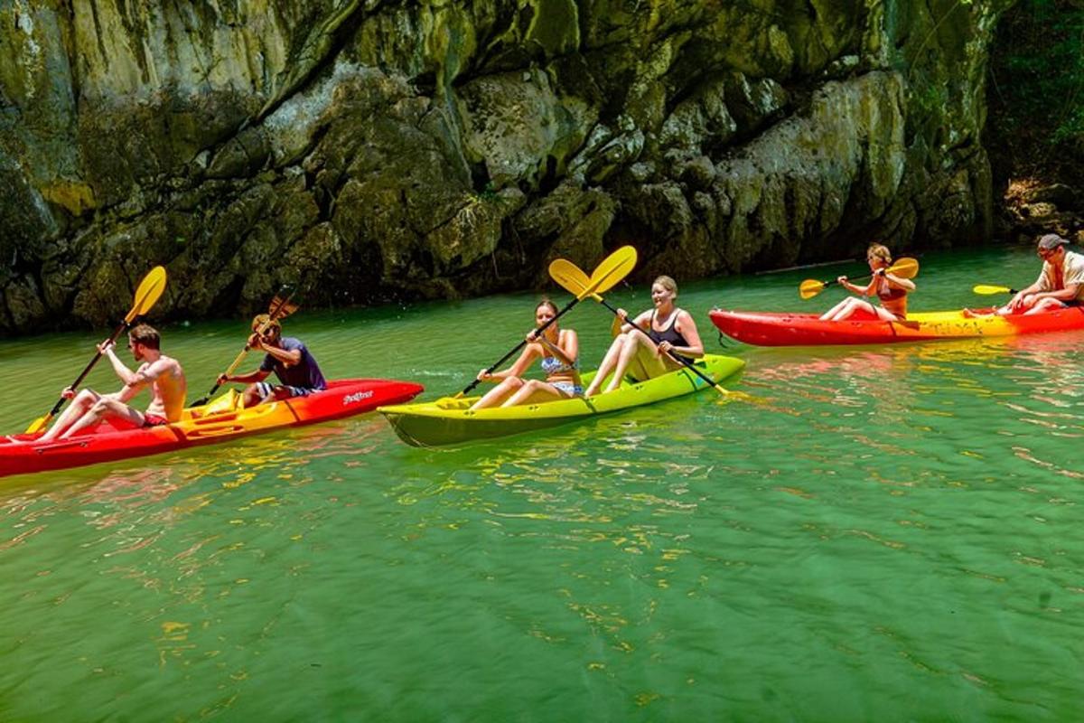 a group of people on kayaks in the water