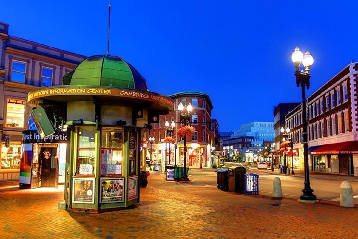 a city street with a building with a green dome