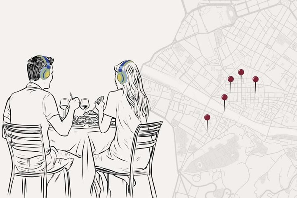 a man and a woman sitting at a table eating food