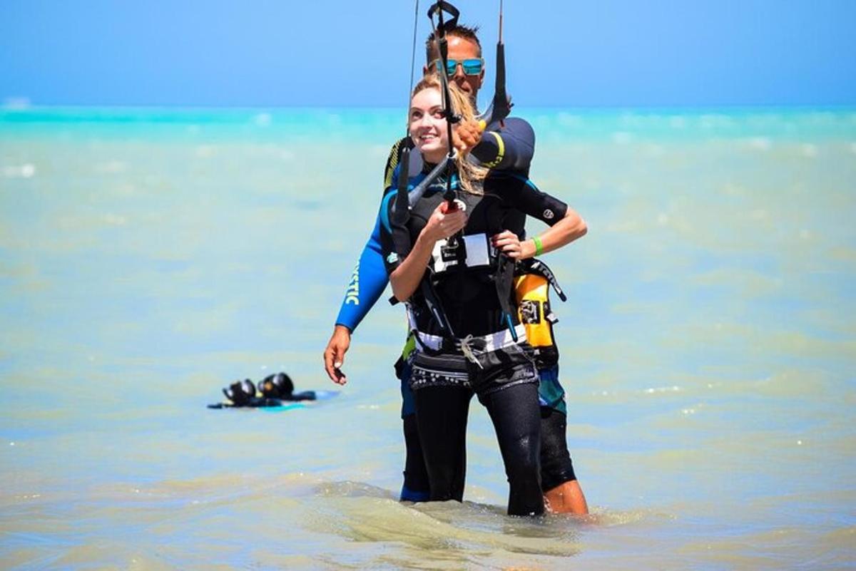 a man and a woman standing in the water