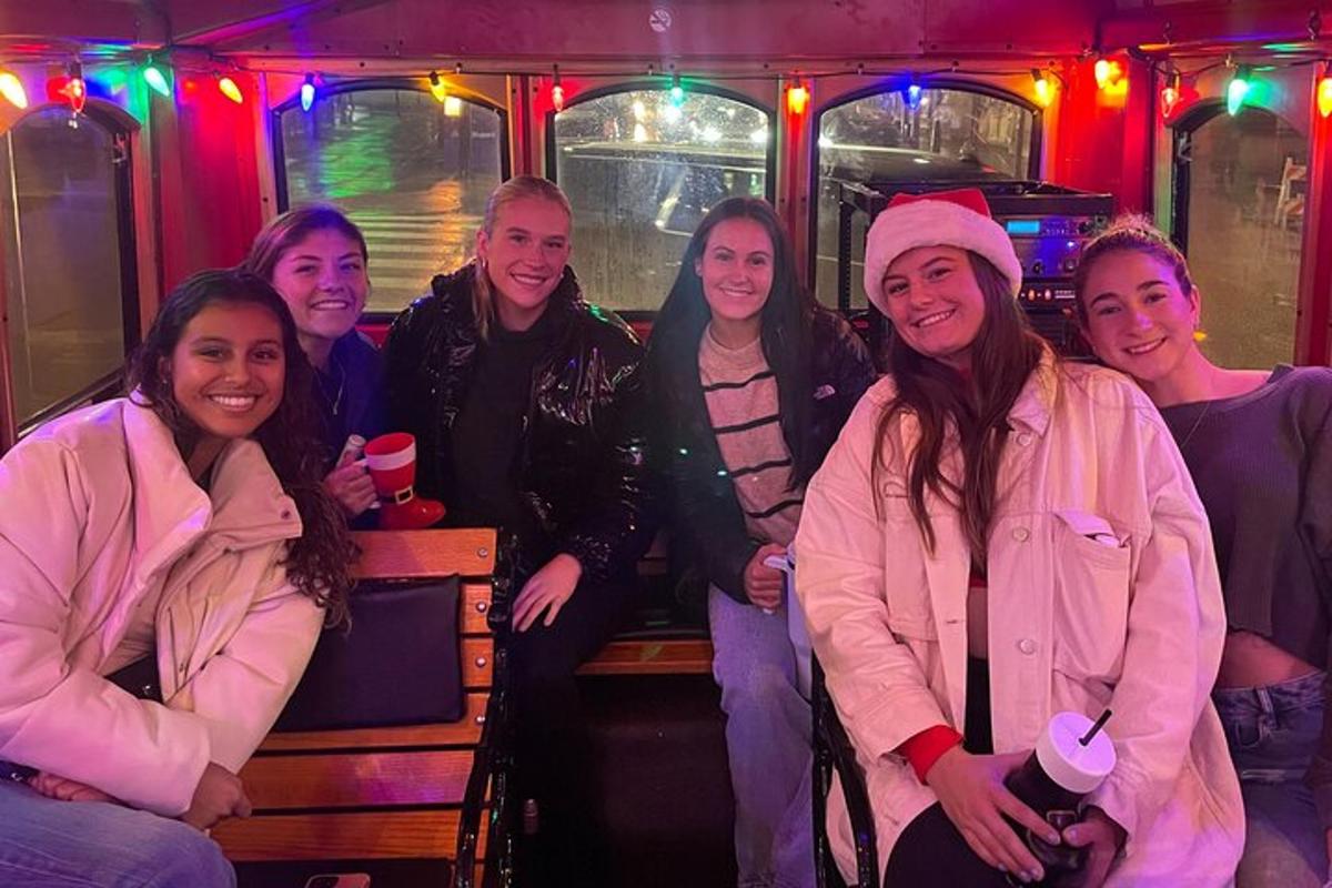 a group of women posing for a picture in a party