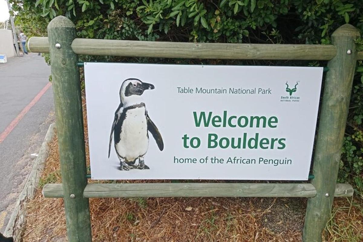 a sign for a welcome to boulders home of the african penguin