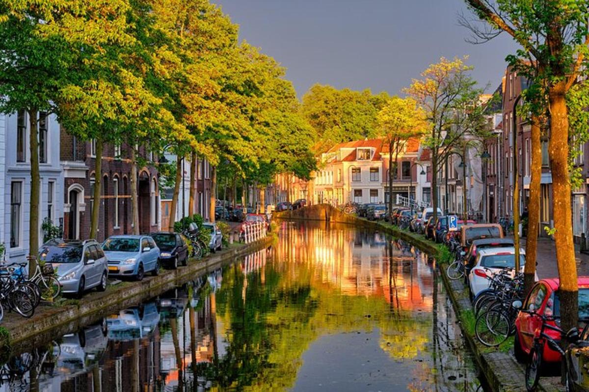 a river with cars parked on the side of it