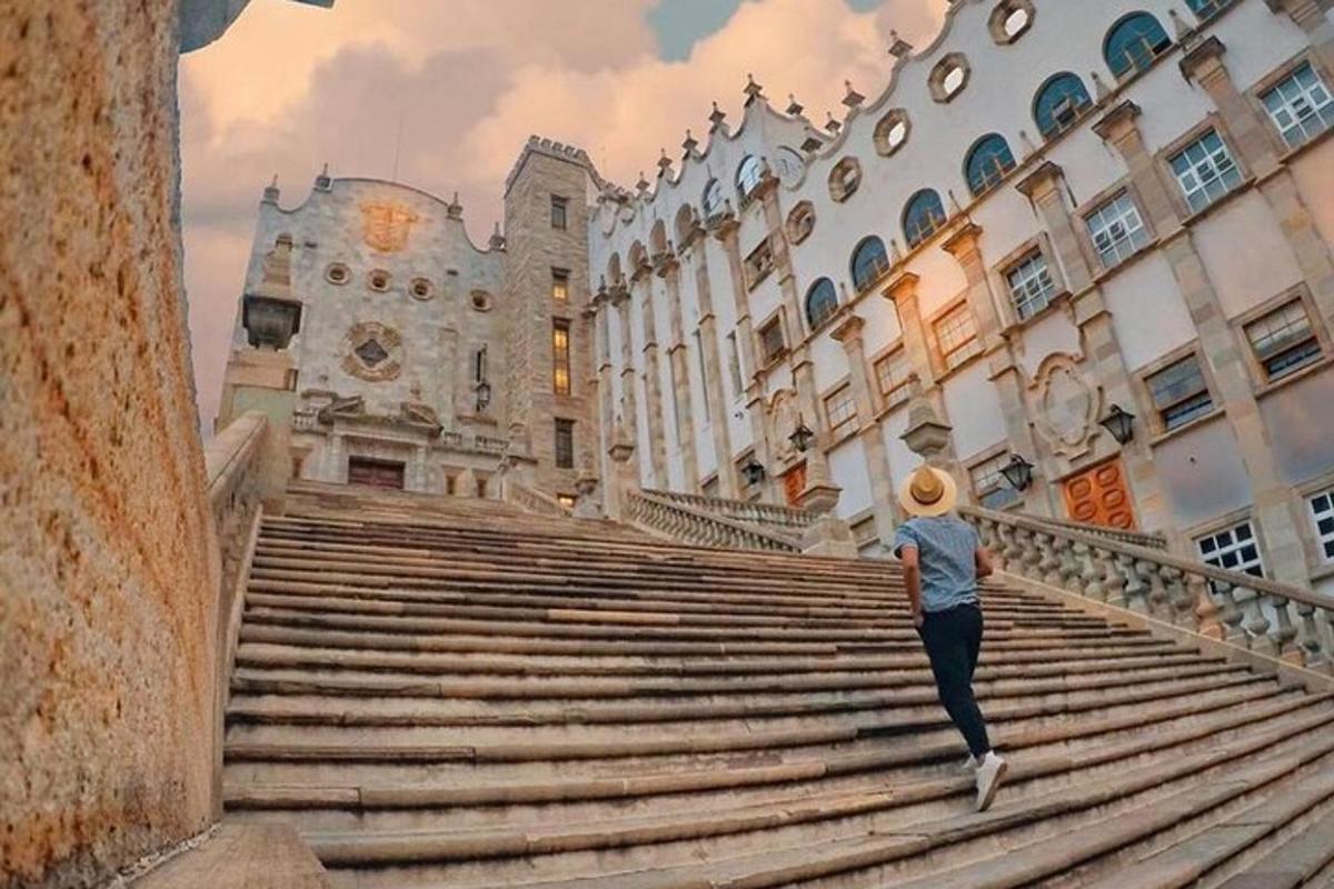 a woman walking up the stairs of a building
