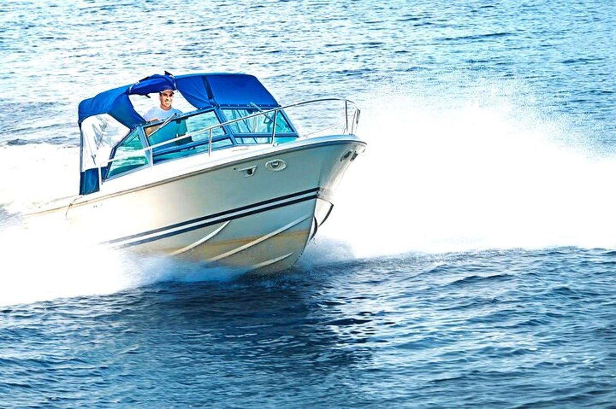 a man in a boat on the water