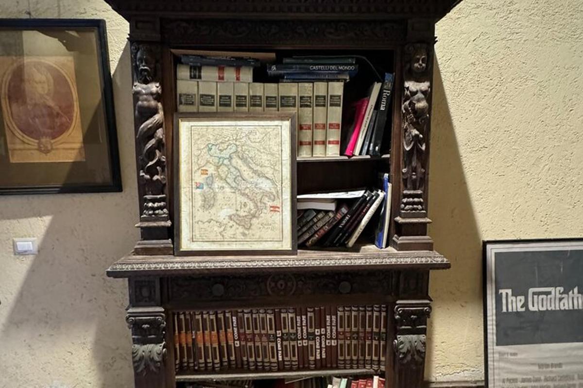 a wooden book shelf with a map and books