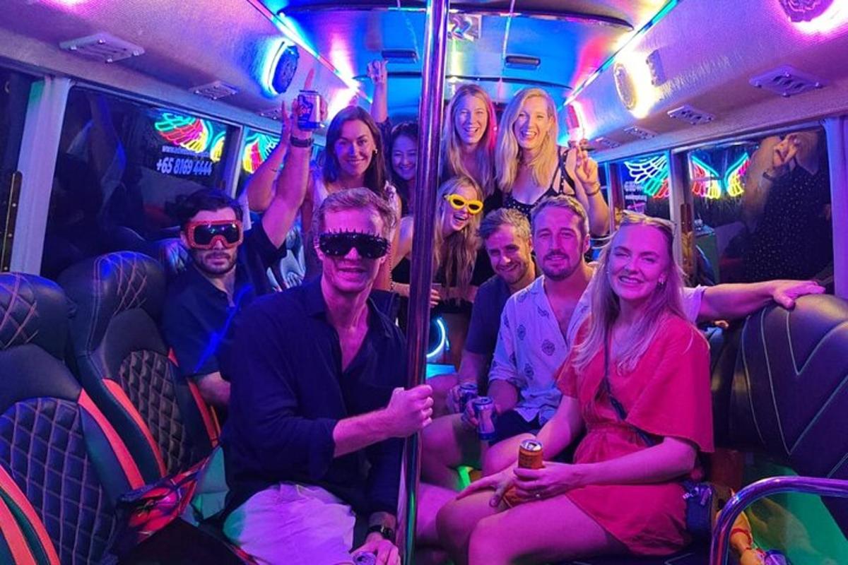 a group of people sitting on a bus