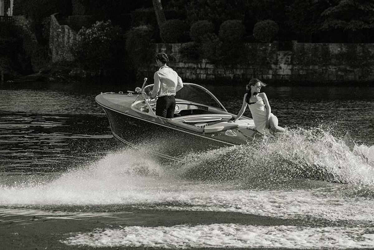 two people on a boat in the water