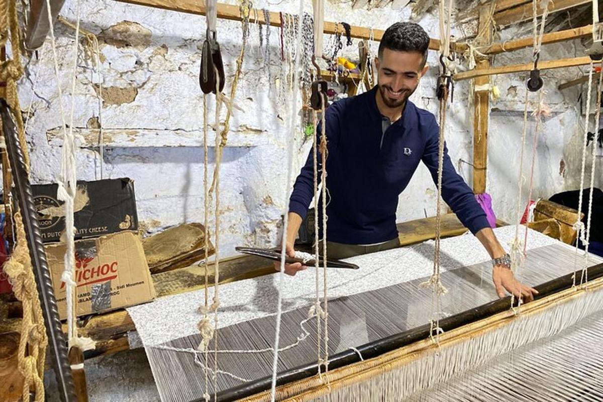 a man is making a net on a table